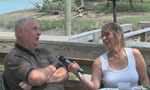 Marcia Lynn talks with Richard Sinners on the Deck of Capt Daves Dockside Restaurant